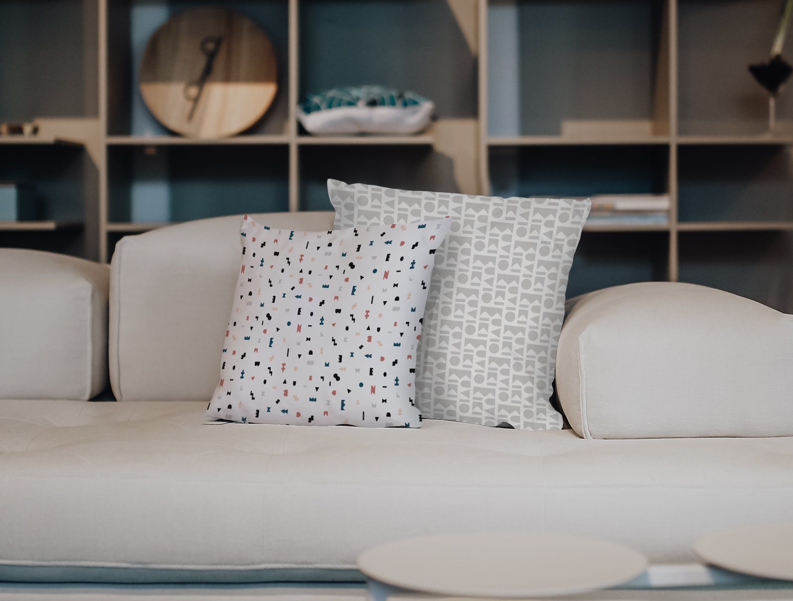 Cushions with Kuvio Kiki patterns on a sofa
