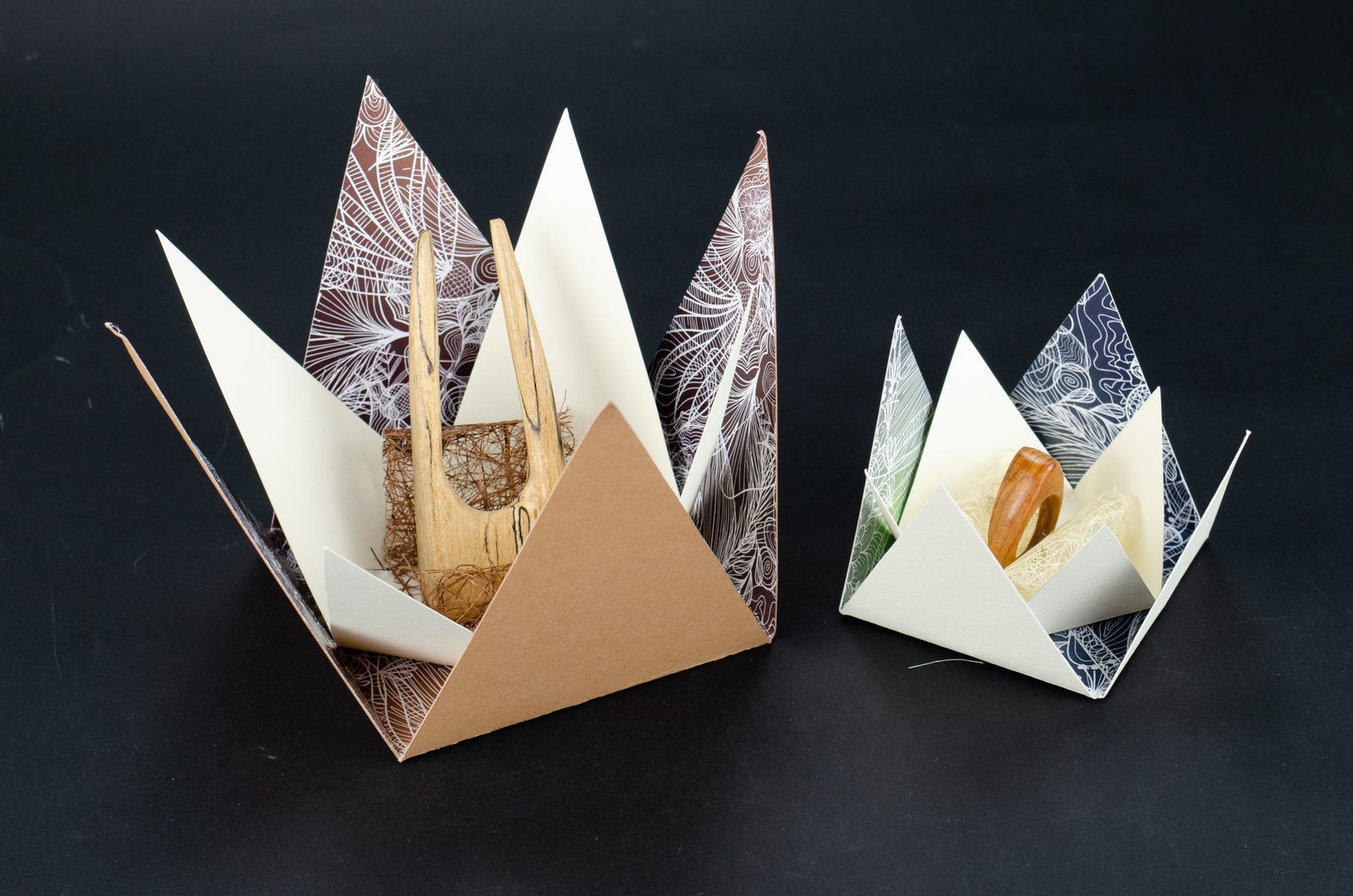 Open boxes with patterned points around the gifts