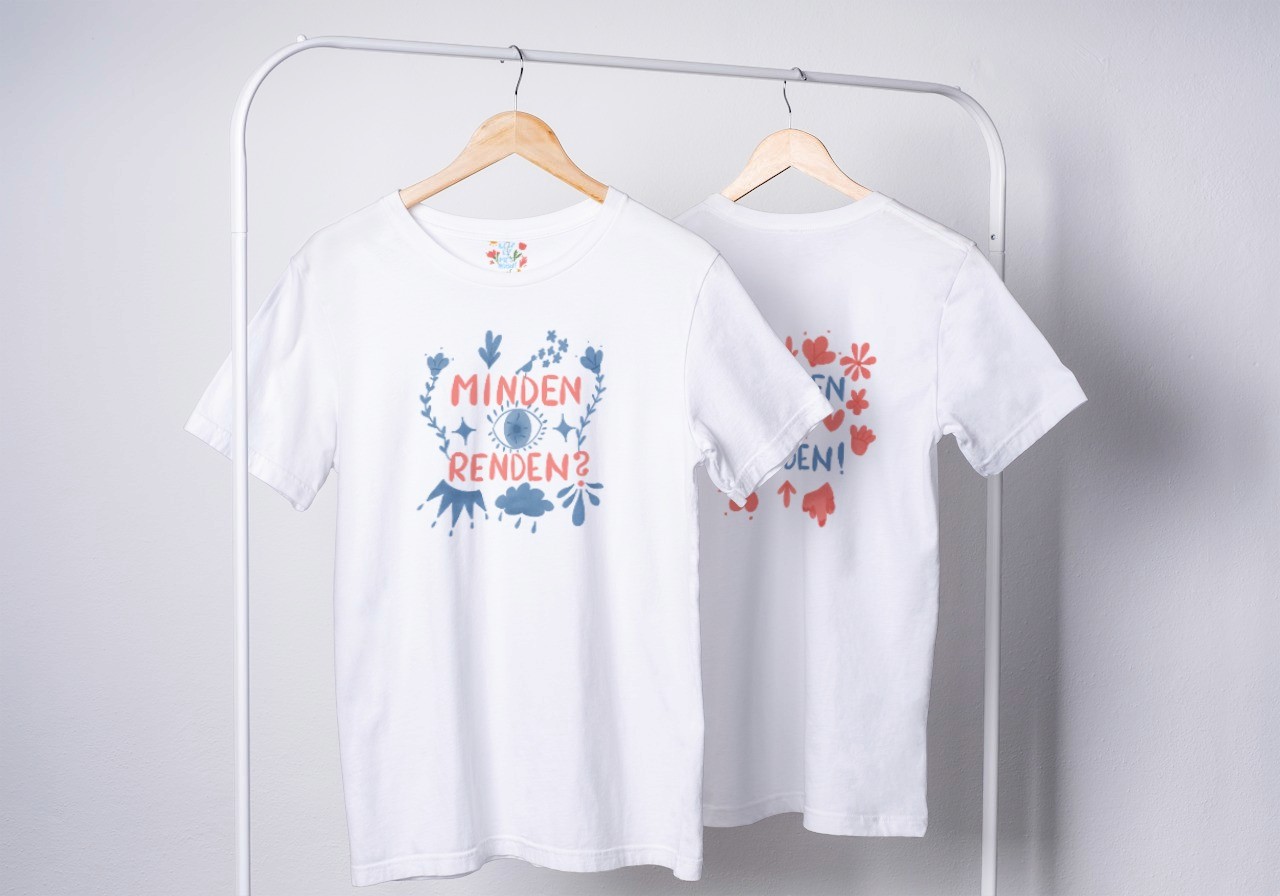 T-shirts with the merch designs on a rail